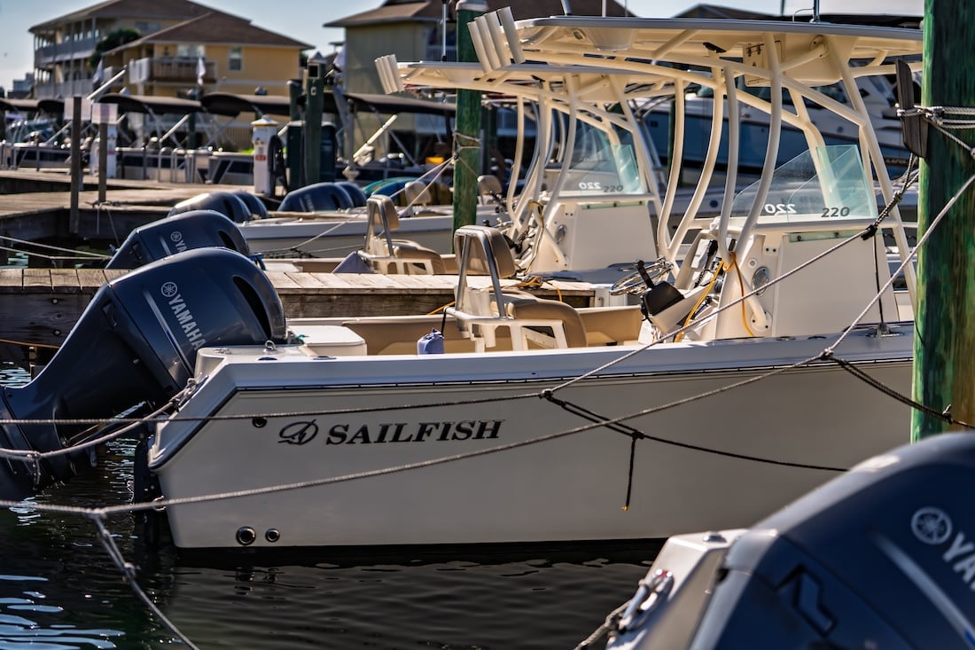 row of sailfish single engine center console boats in destin fl