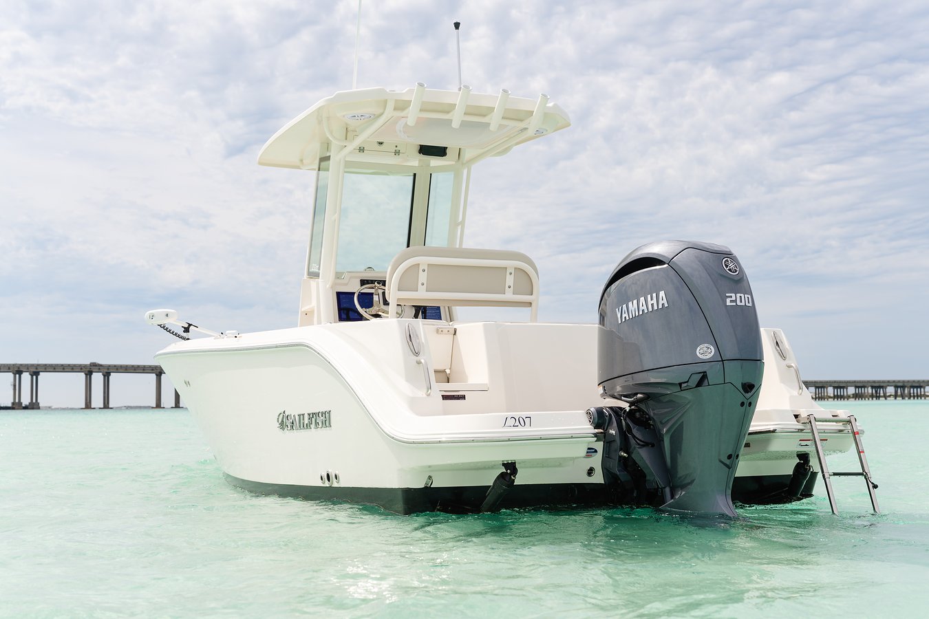 Sailfish 232 center console fishing boat parked at crab island in destin