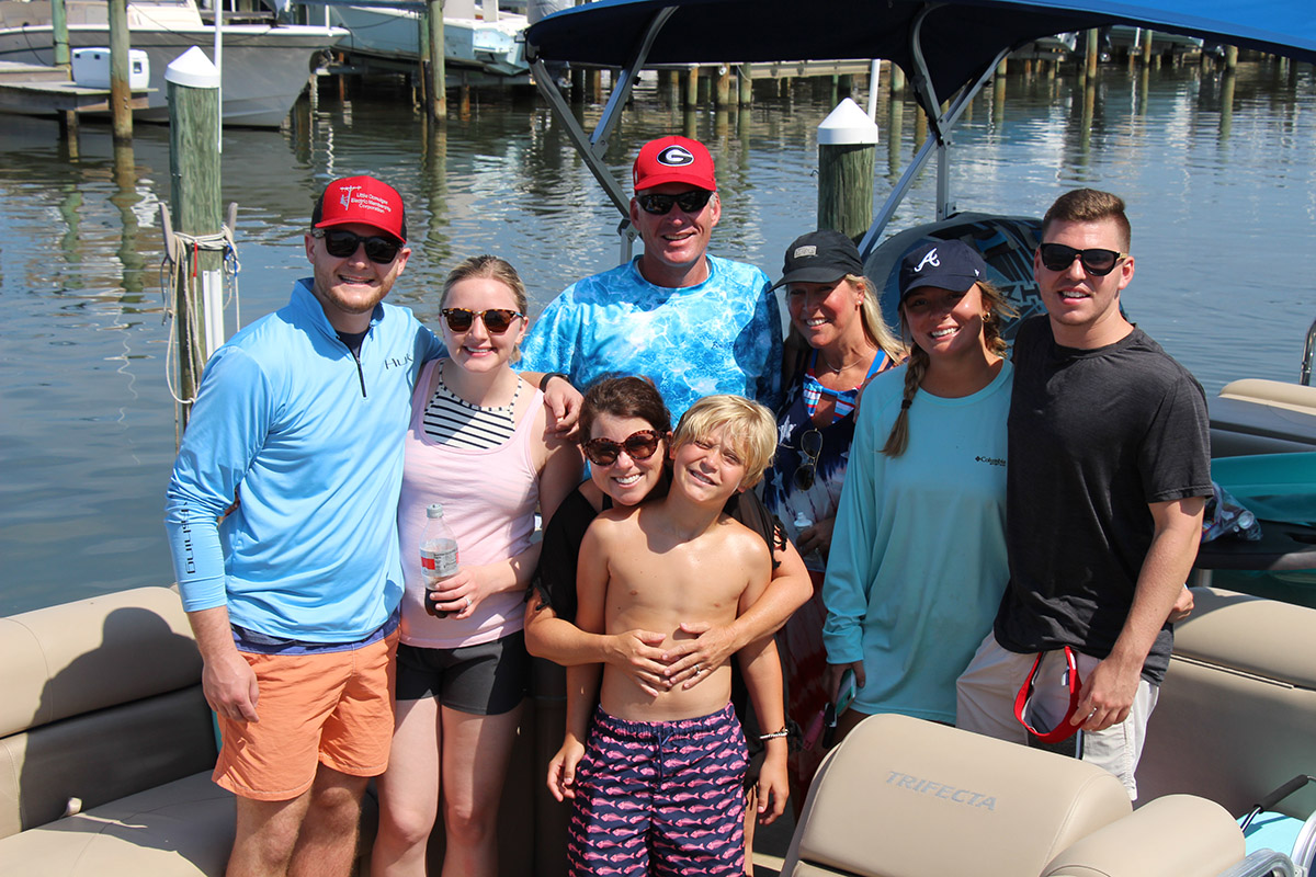 Family on a boat in Destin, Florida