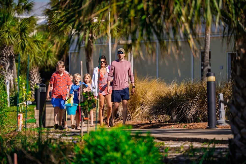 family arriving at legacy marina in destin, fl