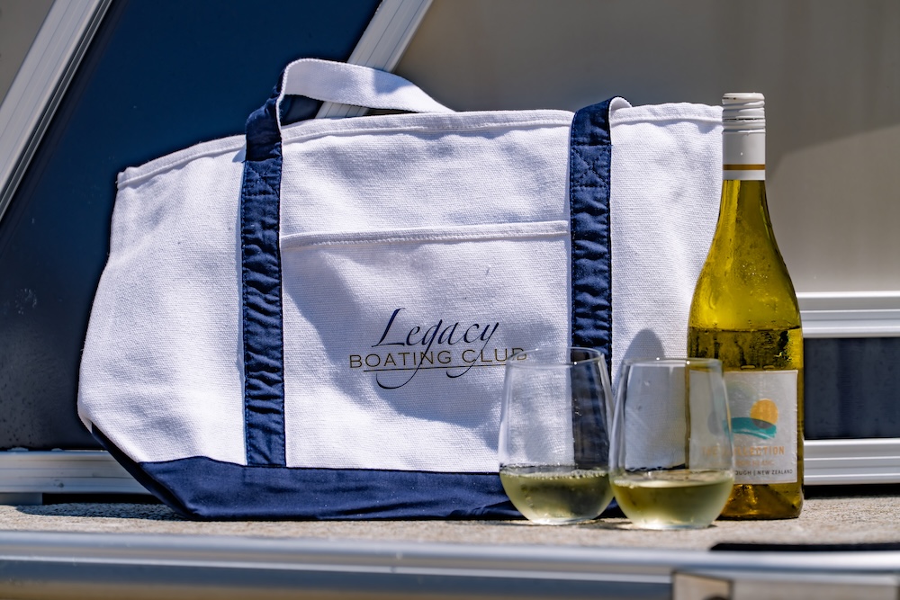 legacy boating club bag with bottle of wine and two glasses