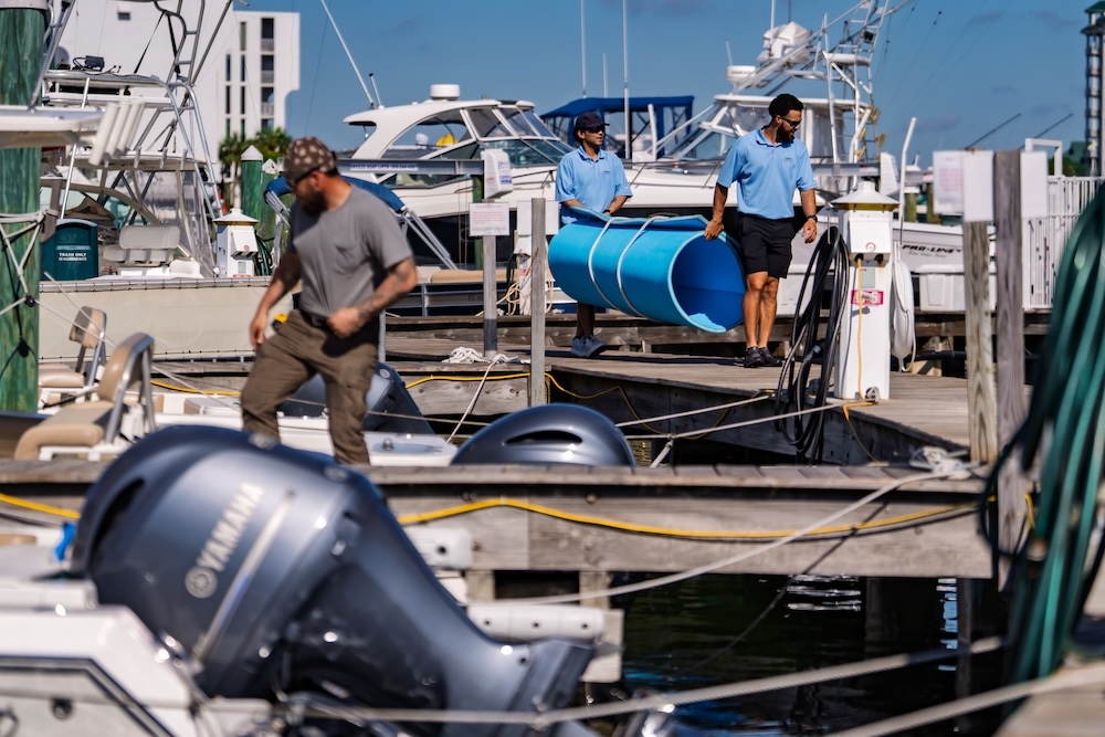 legacy dock and maintenance crew prepping boats